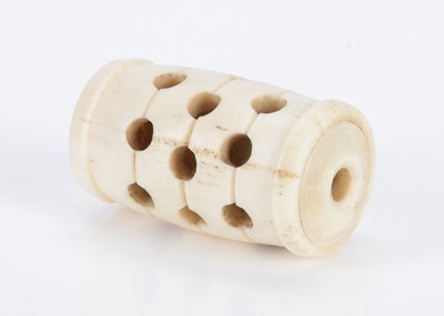 Lot 258 - An 19th century bone barrel shaped rattle