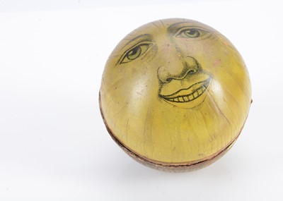 Lot 285 - A German printed card man in the moon candy container ball, circa 1910