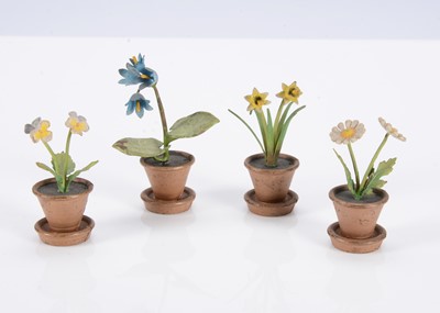 Lot 493 - Four cold painted bronze flower pot place settings