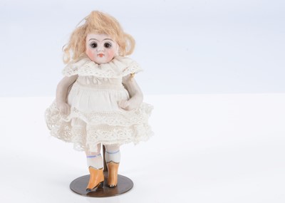 Lot 498 - A small 19th century Kling 96.5 all-bisque doll