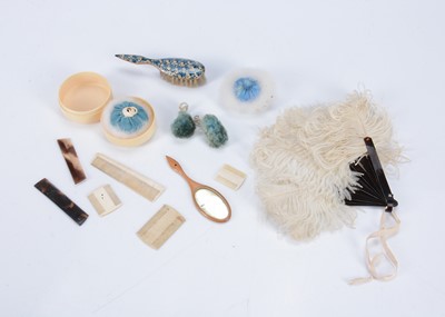 Lot 518 - 19th century fashion doll grooming accessories