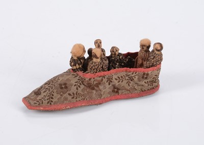 Lot 519 - An 19th century handworked cloth old woman who lived in a shoe