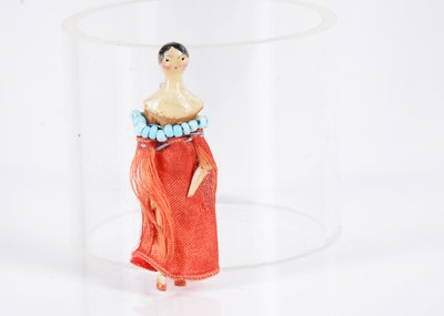 Lot 521 - An 19th century Grodnertal carved wooden miniature dolls’ house doll