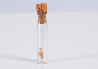 Lot 525 - An 19th century Grodnertal carved wooden miniature dolls’ house doll