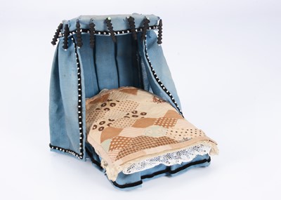 Lot 530 - An 19th century English card and cloth dolls’ house half-tester bed