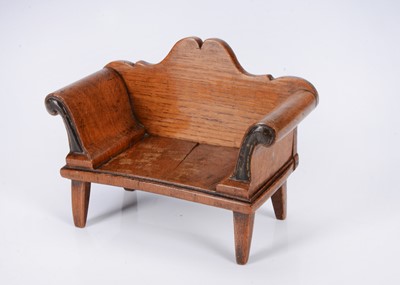 Lot 532 - An 19th century English carved oak dolls’ house sofa