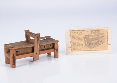 Lot 536 - A rare early 19th century dolls’ house Box Mangle