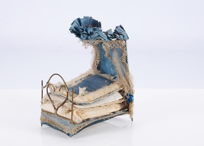 Lot 540 - An 19th century wire dolls’ house half-tester bed