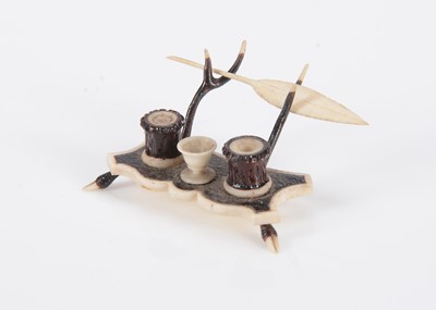 Lot 557 - A rare 19th century bone ‘antler’ dolls’ house inkstand