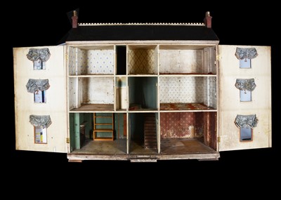 Lot 562 - A large 19th century English painted wooden red brick dolls’ house