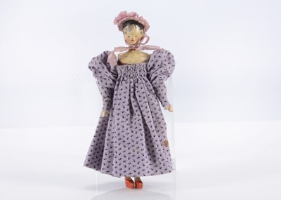 Lot 567 - An 19th century Grodnertal carved wooden dolls’ house doll