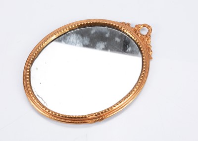 Lot 573 - A large late 19th century German gilt metal dolls’ house mirror