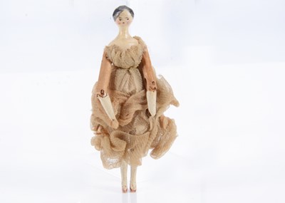 Lot 676 - An 19th century Grodnertal carved wooden dolls’ house doll