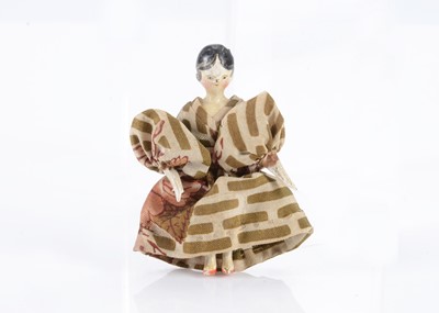 Lot 677 - An 19th century Grodnertal carved wooden small dolls’ house doll