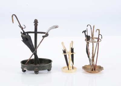 Lot 678 - Three 19th century German dolls’ house stick stands