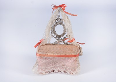 Lot 683 - A late 19th century German soft metal and wood dolls’ house dressing table
