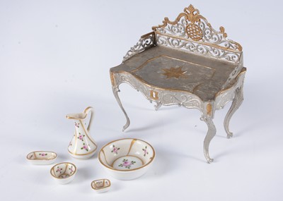 Lot 686 - An 19th century German soft metal dolls’ house dressing table