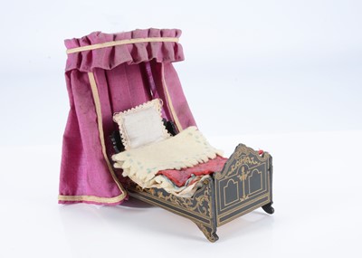 Lot 687 - An 19th century Waltershausen dolls’ house bed