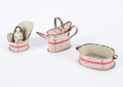 Lot 688 - An 19th century German painted tinplate dolls’ house bathing set