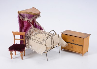 Lot 690 - An 19th century wire dolls’ house bed
