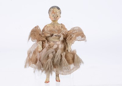 Lot 694 - An 19th century Grodnertal carved wooden dolls’ house doll