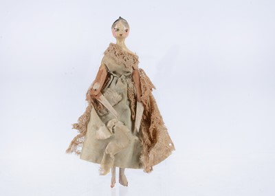 Lot 695 - An 19th century Grodnertal carved wooden dolls’ house doll