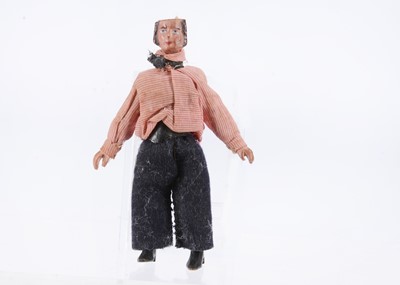 Lot 698 - An 19th century composition ‘alien’ head gentleman dolls’ house doll