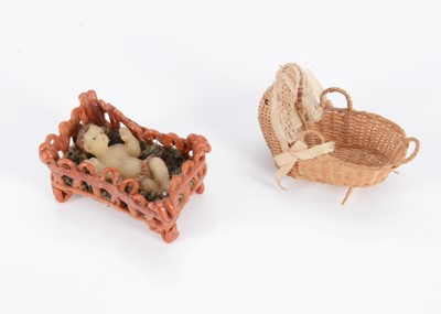 Lot 718 - A fine 19th century miniature dolls’ house cradle