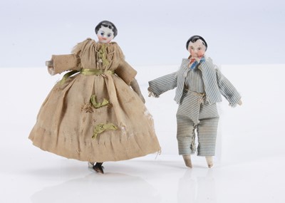 Lot 724 - Two 19th century dolls’ house china shoulder-head dolls