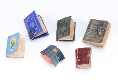 Lot 727 - 19th century miniature dolls’ house books