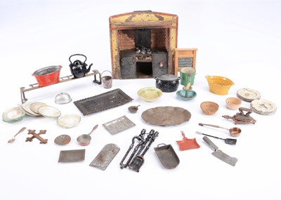 Lot 738 - An early tinplate dolls’ house range