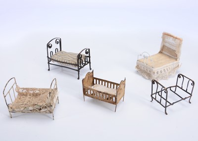 Lot 766 - Five dolls’ house beds
