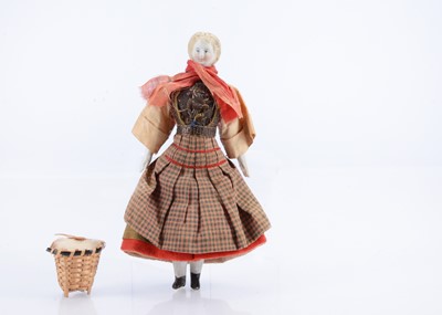 Lot 791 - A fine 19th century large scale bisque shoulder-head dolls’ house doll