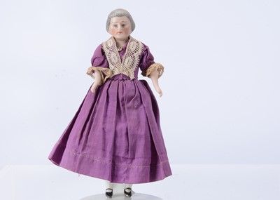 Lot 797 - A rare early 20th century bisque shoulder-head 487 larger size elder lady dolls’ house doll