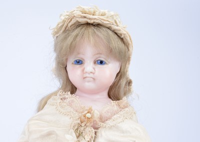 Lot 808 - An 19th century F. Aldis (England) poured wax child doll
