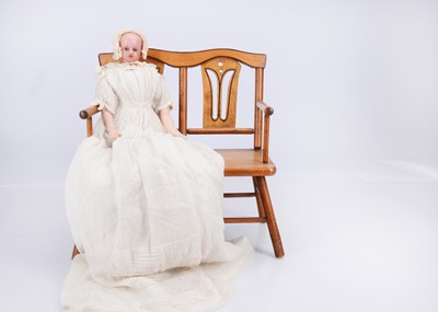 Lot 810 - An 19th century F. Aldis (England) poured wax doll dressed as a baby