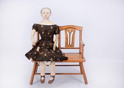 Lot 825 - A mid 19th century Grodnertal carved wooden shoulder-head doll