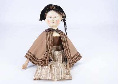 Lot 826 - A mid 19th century Grodnertal carved wooden doll