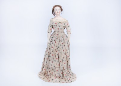 Lot 859 - A rare 19th century German pink tinted china shoulder head wigged doll