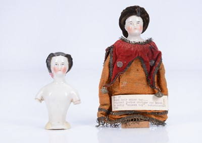 Lot 861 - An 19th century German china head and torso with flowers in her hair