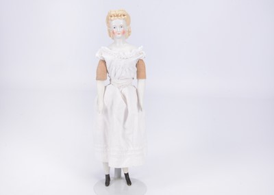 Lot 862 - An 19th century German bisque shoulder head doll with elaborate hair