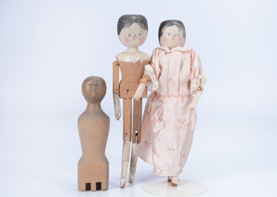 Lot 874 - Three wooden dolls