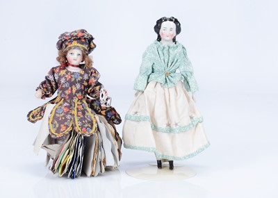 Lot 875 - A fortune telling doll