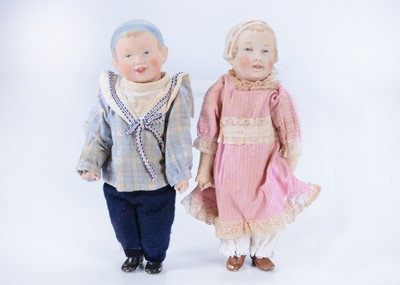 Lot 887 - A pair of Recknagel bisque headed character dolls