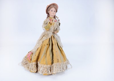 Lot 888 - A French clockwork gliding lady automaton on wheeled platform