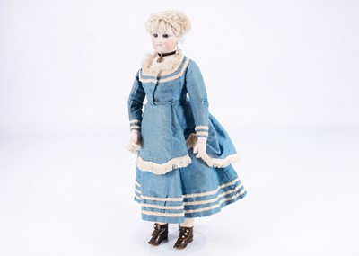 Lot 894 - A fine French fashion doll with swivel head