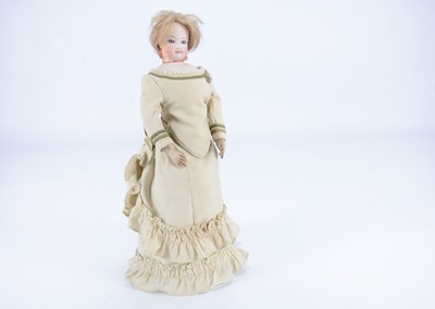 Lot 898 - A French fashion doll with swivel head