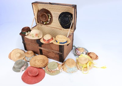 Lot 944 - A 19th century doll's trunk with label