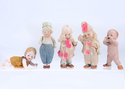 Lot 974 - Five all bisque child character figures 