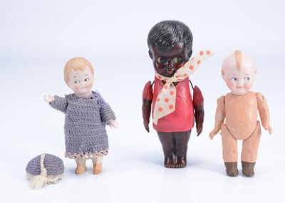 Lot 980 - Two googly eyed character baby dolls